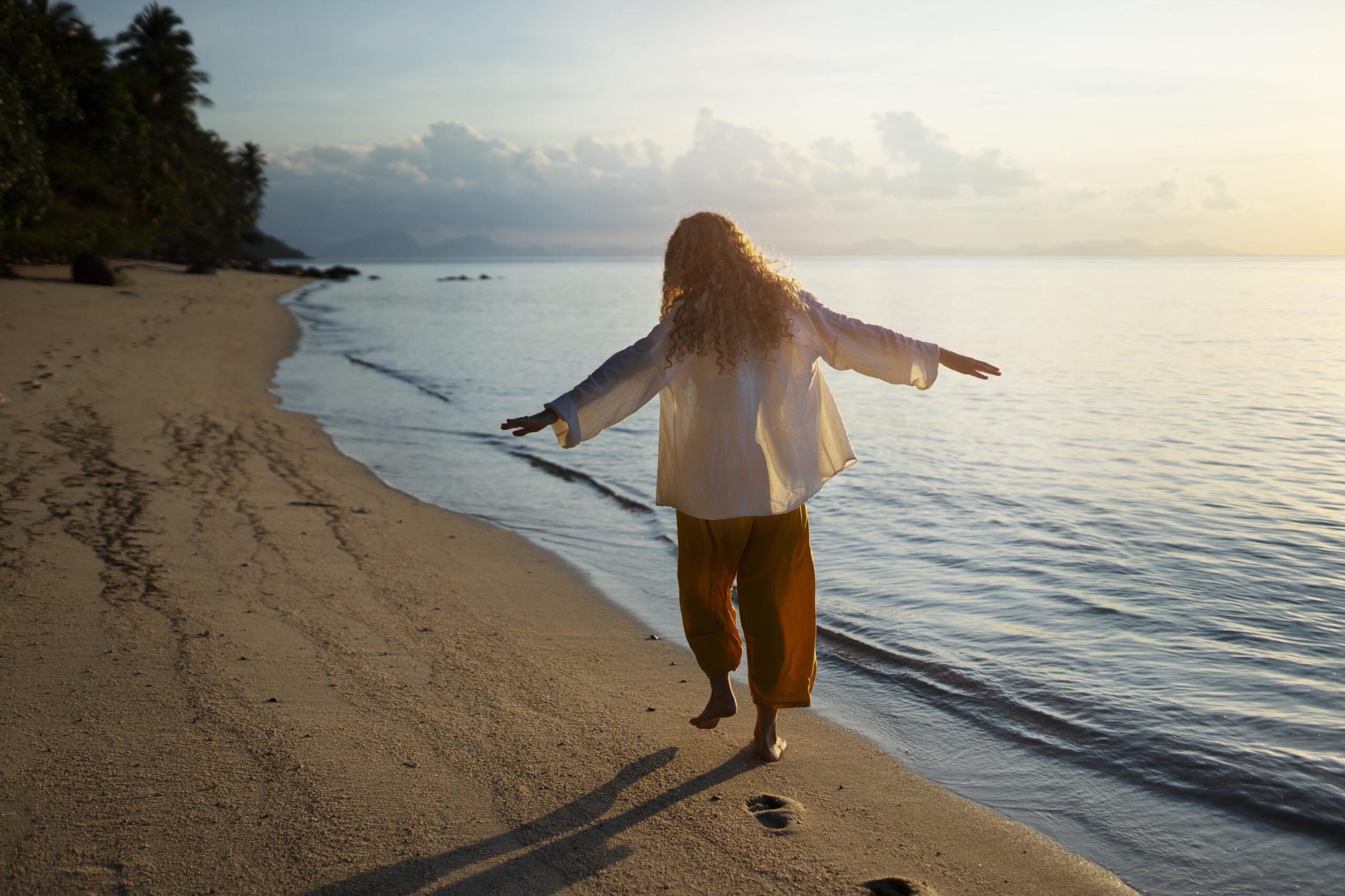 woman walking beach